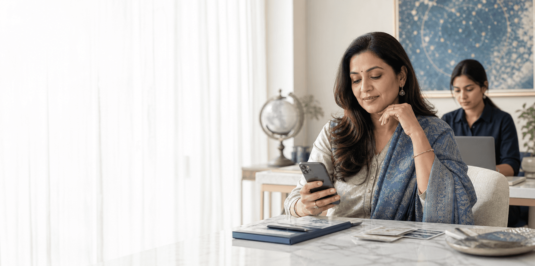An established astrologer reviewing a personalized guidance conversation in her consultation studio